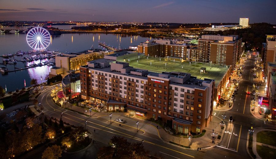 National Harbor waterfront and Capital Wheel at dusk near Washington, D.C.